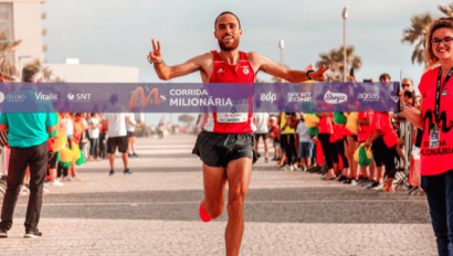 Marathon winner crossing finish line